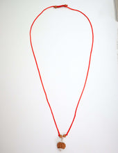 Benefits of 9 Mukhi Rudraksha